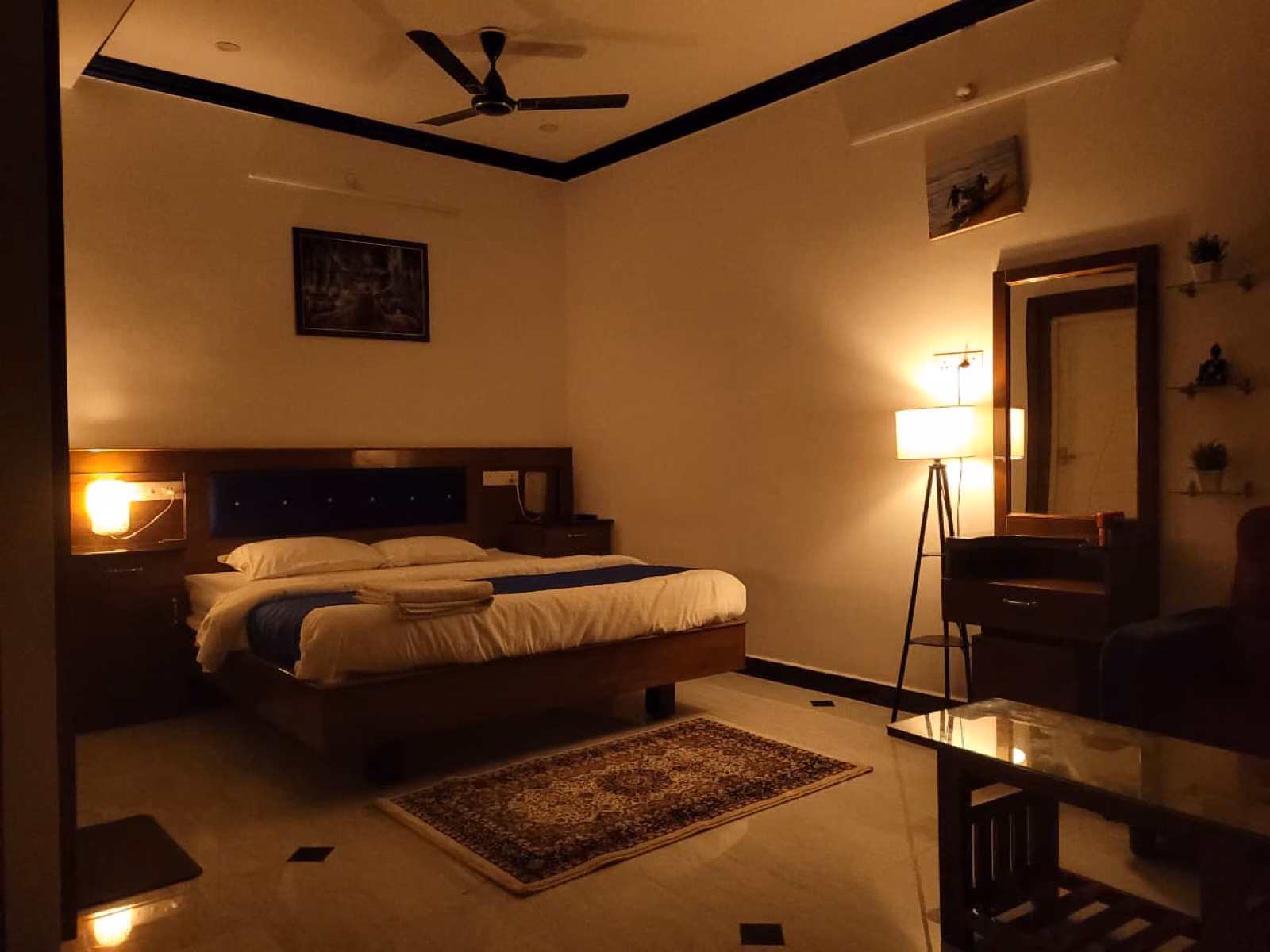 King bedroom at night with mood lighting